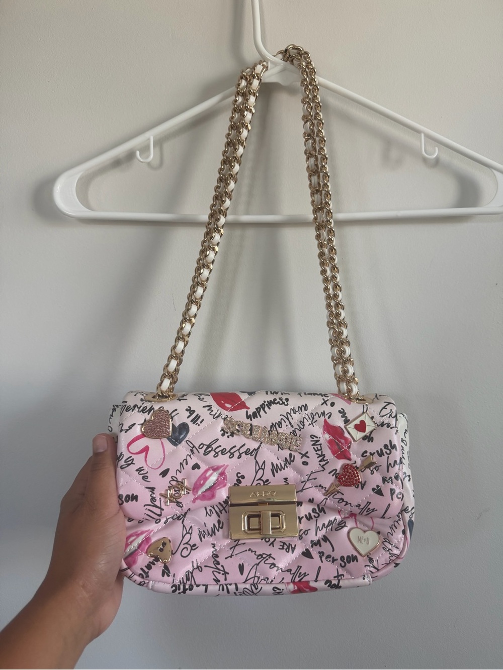 Aldo Pink Quilted Crossbody with Gold Chain and Lip & Heart Motifs
